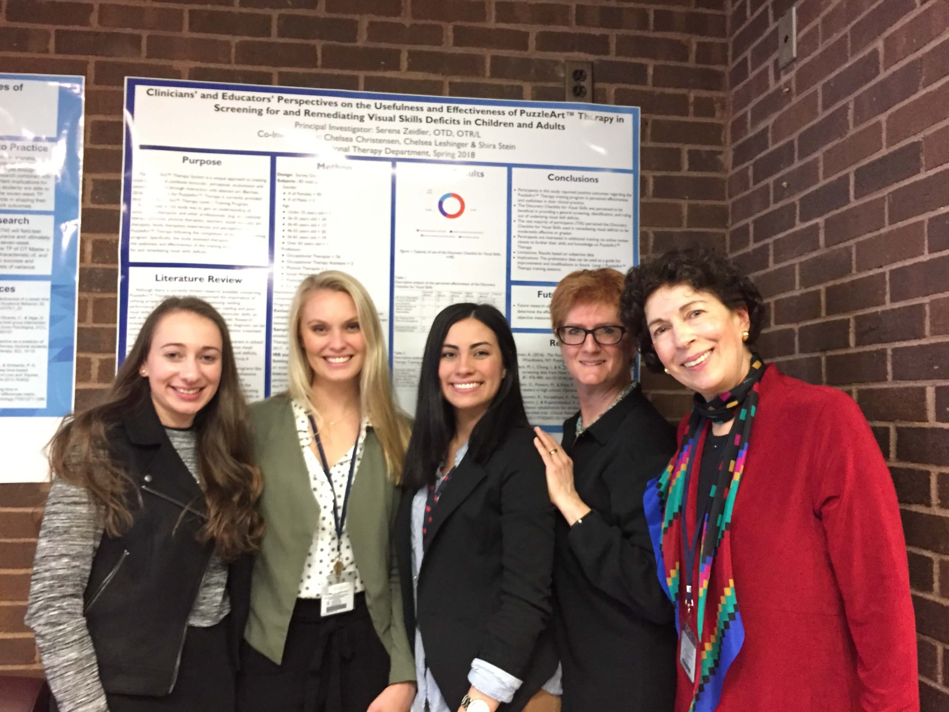 Students at the School of Health Sciences Occupational Therapy program delivered their final presentations in May. Above, students worked with SHS OT Professor Serena Zeidler (far right) to examine the efficacy of a new therapy tool.
