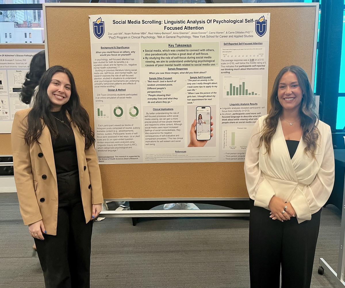 Jessie and Zoe Presenting a Poster from the ME lab