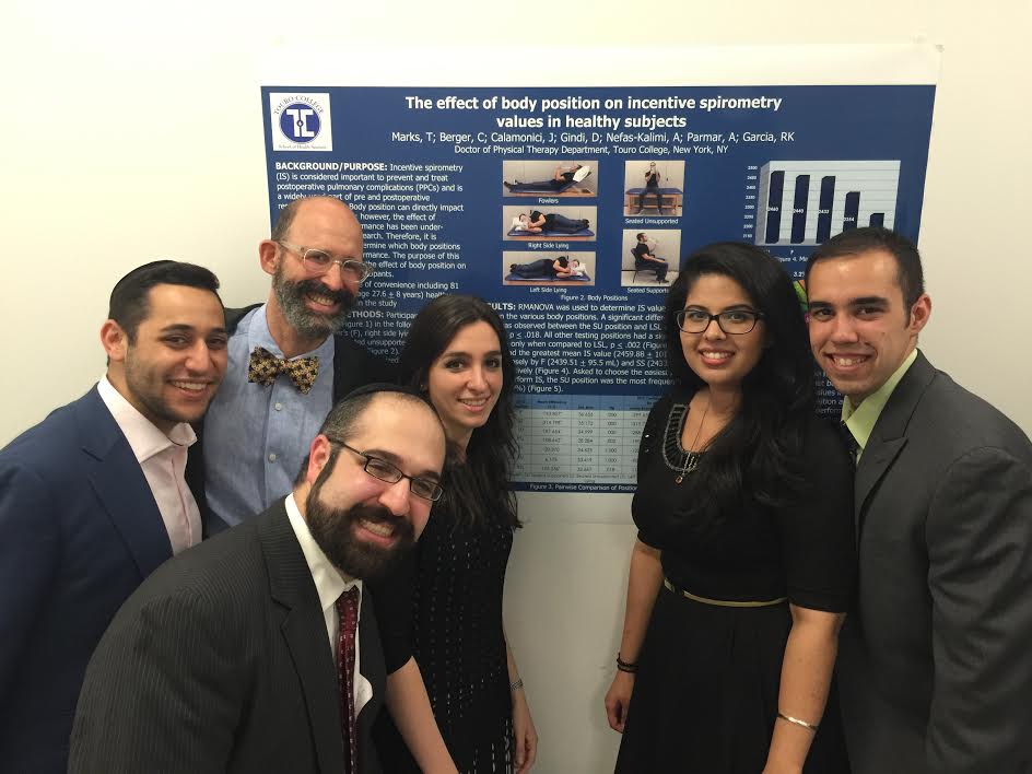 Students at Touro College School of Health Sciences investigated the best positions for using an incentive spirometer. From left to right: David Gindi, Dr. Ted Marks, Shimon Nefas-Kalimi, Chava Berger, Amarinder Parmar and Joe Calamonici. \n