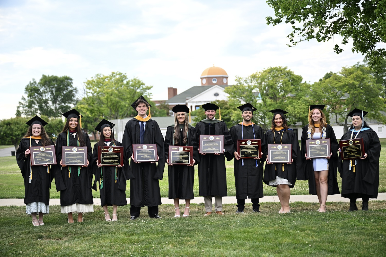 Several students in caps and gowns
