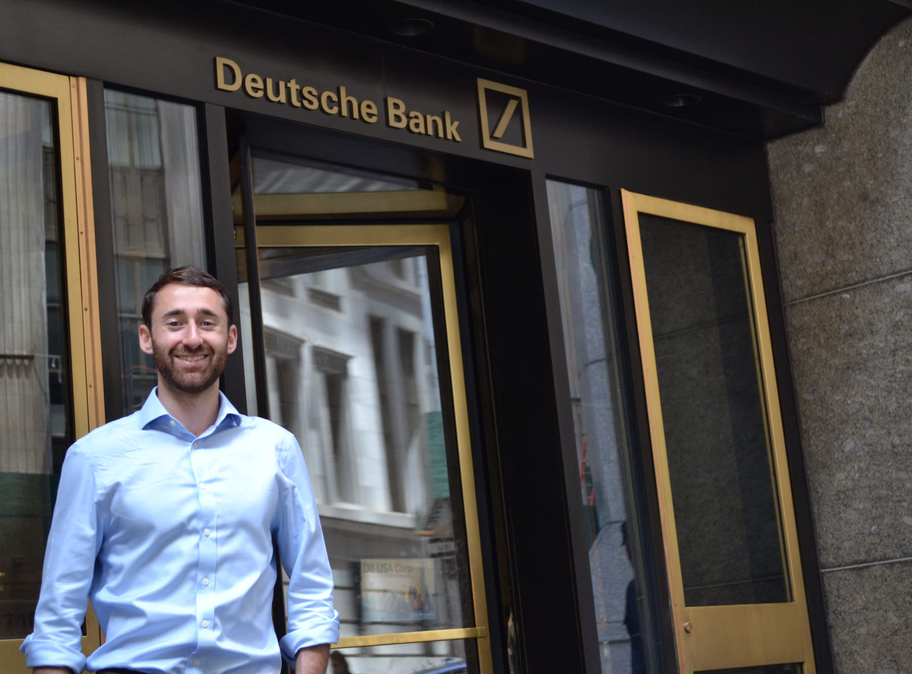 Elan Telem standing in front of Deutsche Bank