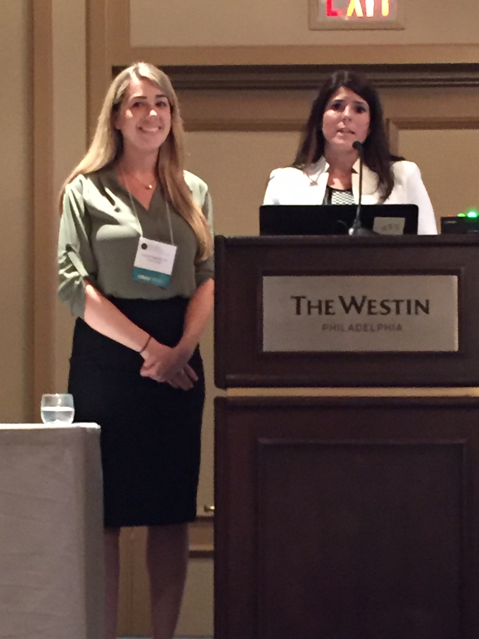 Laurie Giamella, ’16 (left), and Alyssa Decker, SHS ’16, M.S. (right) present at the 45th Annual Voice Foundation Symposium in Philadelphia.