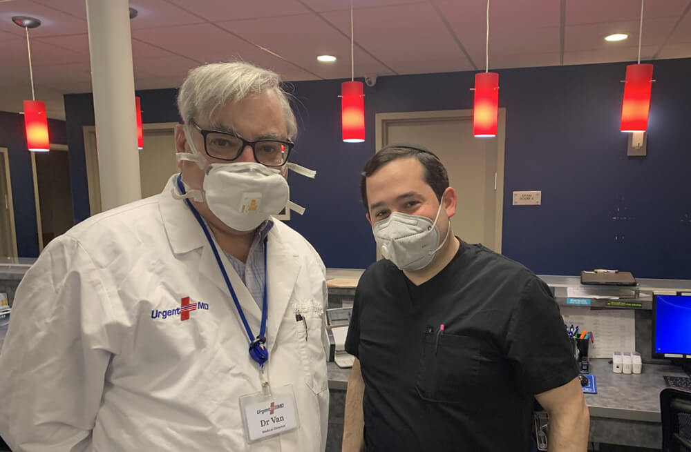 (l-r) Dr. Van Amorengen, Medical Director of Urgent-MD, with Yehuda Schwab, a School of Health Sciences physician assistant student helping patients with COVID-19.