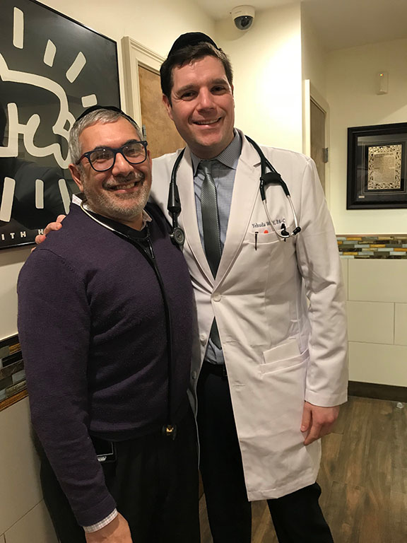 (left to right): Dr. Hylton Lightman, President of Total Family Care, with Yehuda Wolf